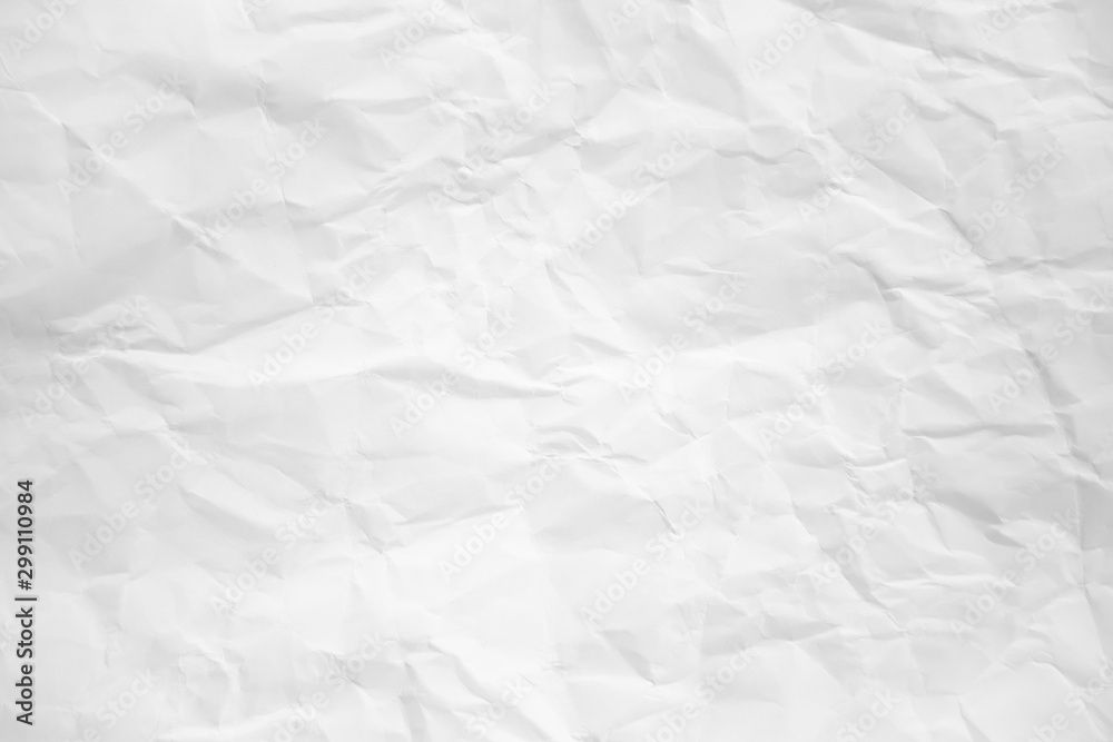 white and gray wide crumpled paper texture background. crush paper so that it becomes creased and wrinkled. white and gray wide crumpled paper texture background. crush paper so that it becomes creased and wrinkled.