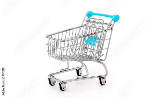 Miniature shopping cart isolated on completely white background