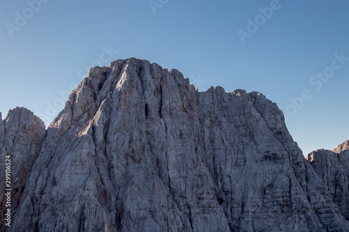 Sunlit mountain peak of Skrlatica
