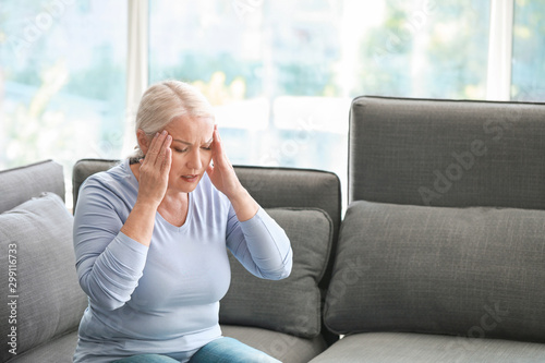 Mature woman suffering from...