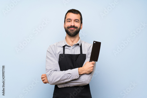 Happy Chef over blue wall