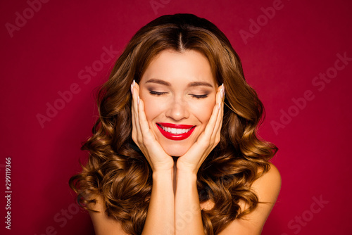 Close-up portrait of her she nice attractive charming lovely cheerful dreamy wavy-haired girl after laser peeling isolated on bright vivid shine vibrant red maroon burgundy marsala color background