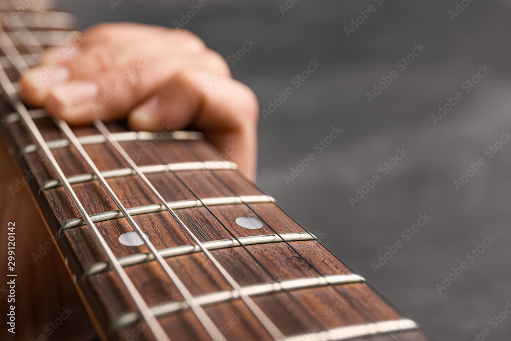 Fototapeta premium Woman with modern acoustic guitar, closeup view