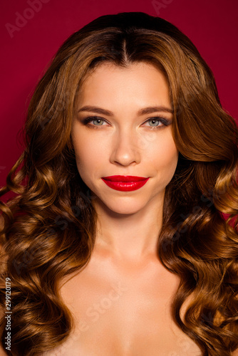 Vertical close-up portrait of her she nice attractive charming confident wavy-haired girl glamorous life isolated bright vivid shine vibrant red maroon burgundy marsala color background