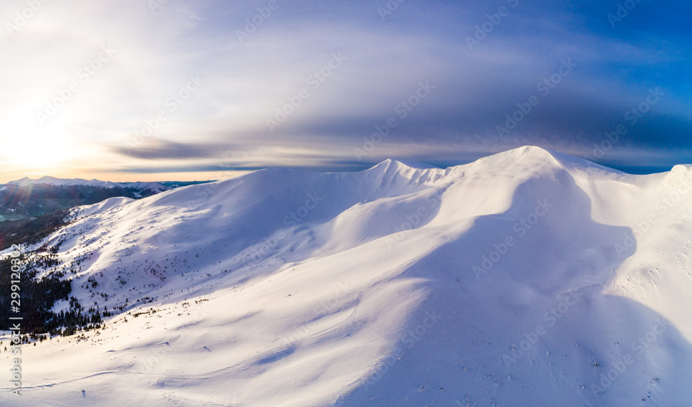Aerial view of beautiful winter mountain slopes Aerial view of beautiful winter mountain slopes