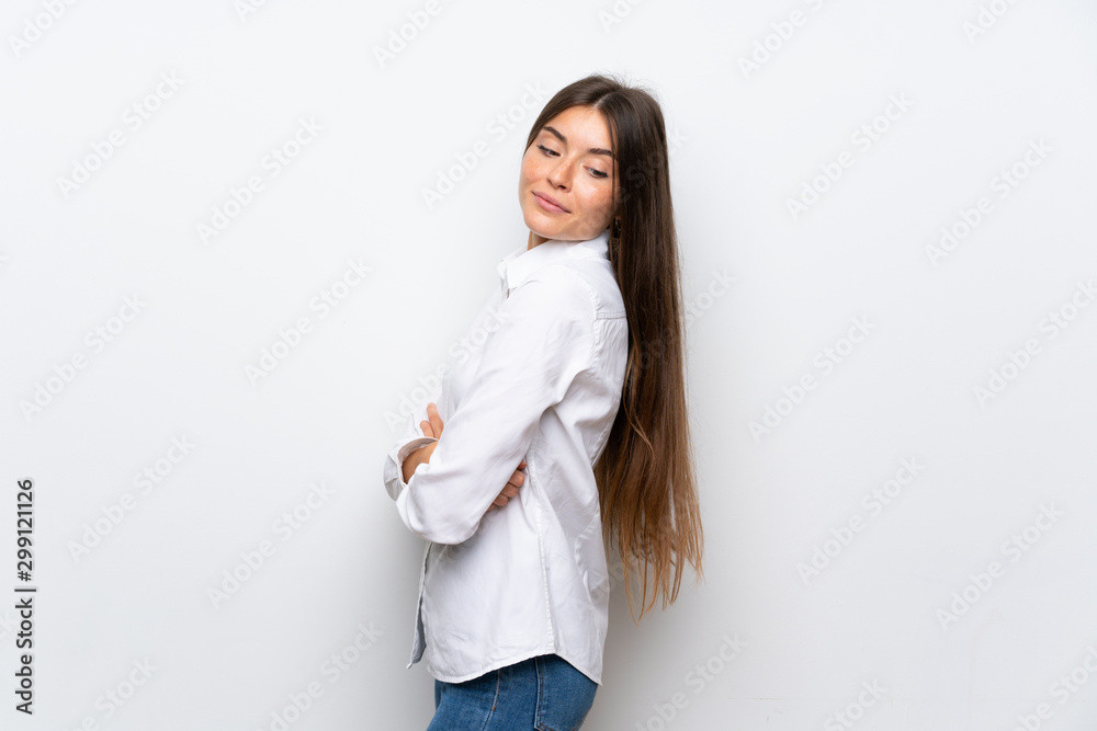 Young woman over isolated white background laughing Young woman over isolated white background laughing