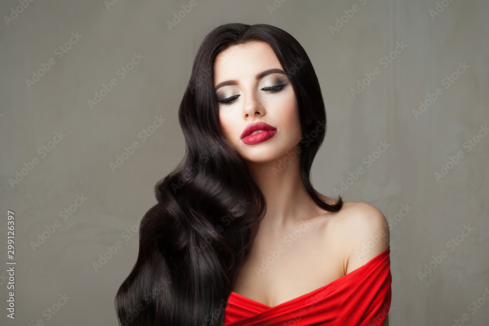 Gorgeous model woman brunette with wavy hairstyle and makeup