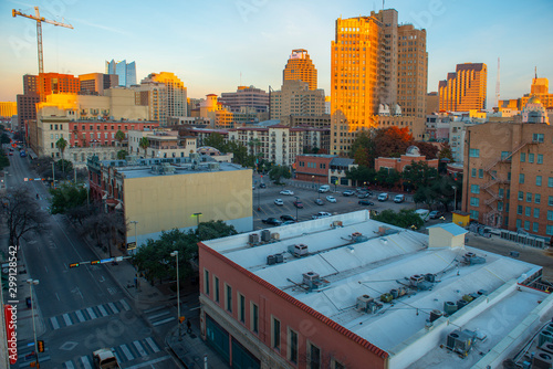 Canvas Print Historic Building on E Commerce St with Weston Centre and Nix Professional Building at the background at sunrise in downtown San Antonio, Texas, USA