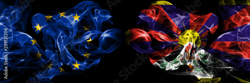 Eu, European union vs Tibet, Tibetan smoke flags placed side by side. Thick colored silky smokes abstract flags photo
