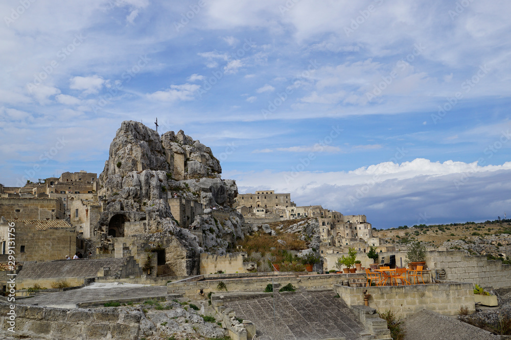 02_A look at the characteristic cliff and the cave church Madonna de Idris, Matera, Italy.