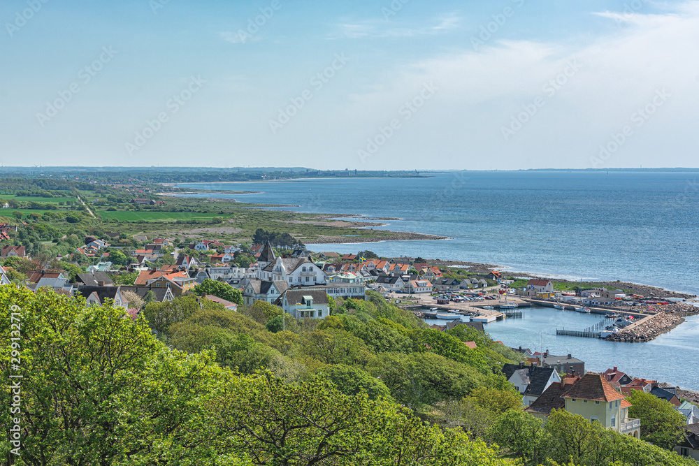 View from above to the swedish coastal city with boats and houses