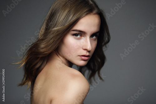 Studio portrait of young beautiful woman