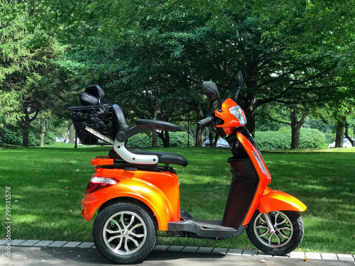 An orange electric scooter