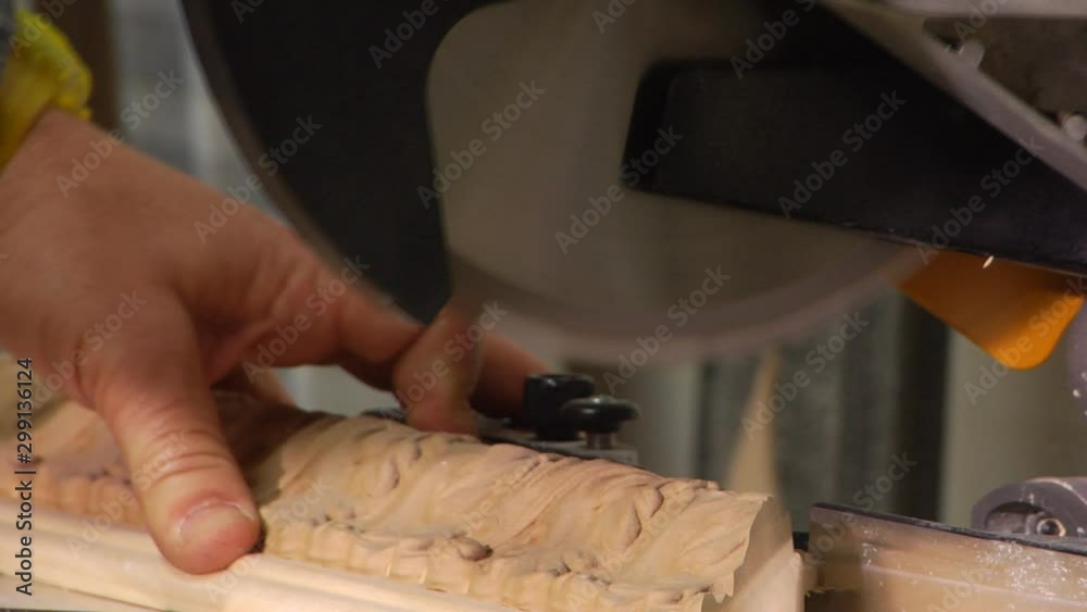 a framer cuts a frame with an electric saw a framer cuts a frame with an electric saw