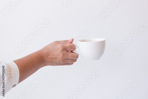Woman hand holding white cup hot espresso coffee menu isolated on white background.Hot drink menu for customer in the coffee shop or restaurant.