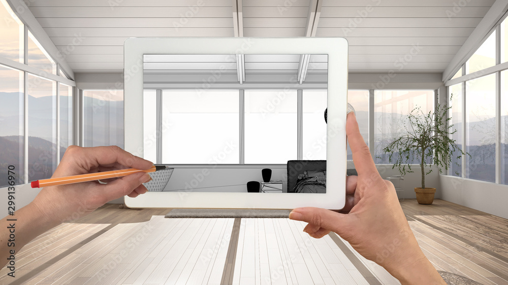 Hands holding and drawing on tablet showing modern white bedroom with bathtub details CAD sketch. Real finished interior in the background, architecture design presentation Hands holding and drawing on tablet showing modern white bedroom with bathtub details CAD sketch. Real finished interior in the background, architecture design presentation