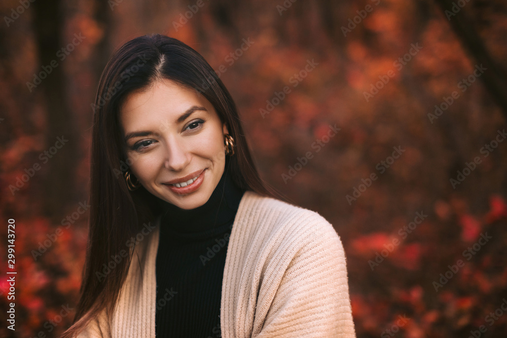 Close-up portrait of beautiful woman in park in autumn. copy space Close-up portrait of beautiful woman in park in autumn. copy space
