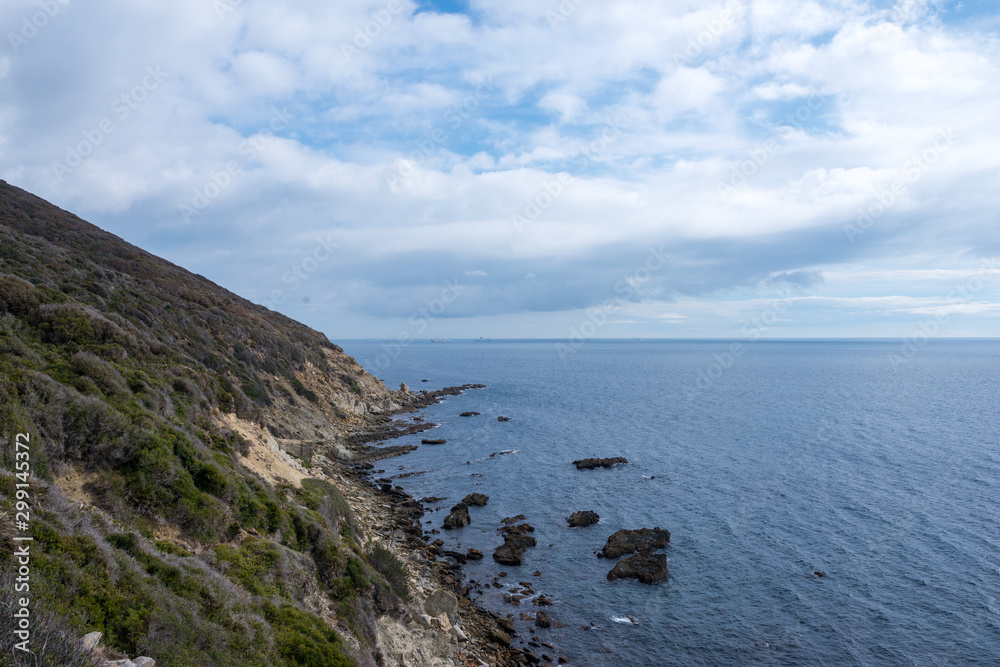 Rocky coast on the cliff next to Las Arenas beach in the Natural Park of Algeciras Rocky coast on the cliff next to Las Arenas beach in the Natural Park of Algeciras