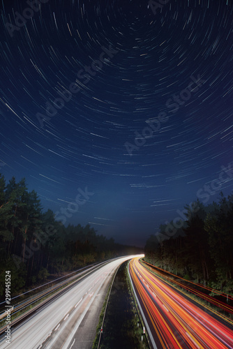 Truck light trails on highway. Art image . Long exposure photo taken on a highway
