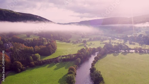 Aerial Shoot over River Valley at Autumn photo