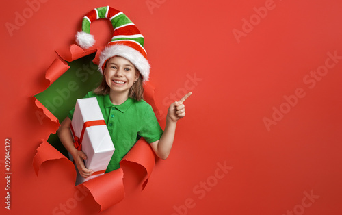 Cuadro en lienzo Santa's elf on bright color background