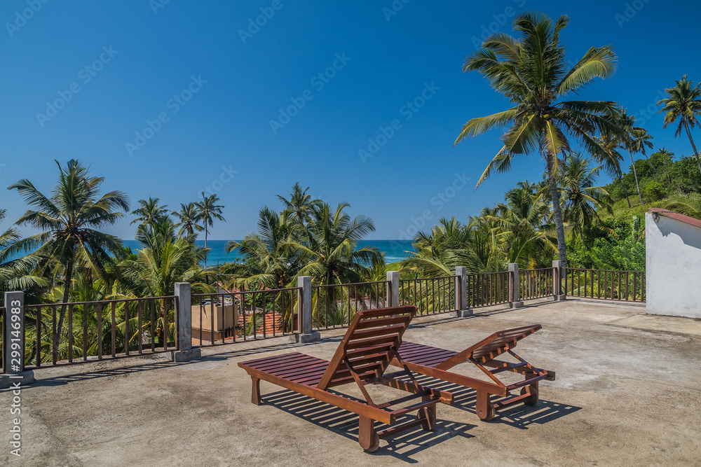 Terrace with ocean and tropical view