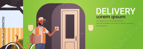 african american courier man delivering cardboard parcel ringing house doorbell express delivery service concept horizontal full length flat copy space vector illustration