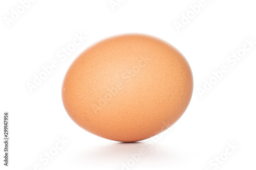 One whole chicken egg isolated on white background