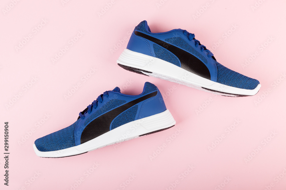 Varna , Bulgaria - APRIL 24, 2019: PUMA ST TRAINER EVO KNIT sport shoes on  pink background. Puma