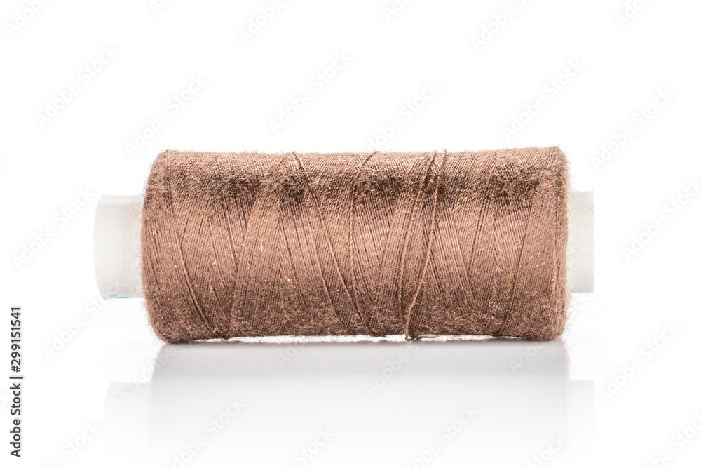 One whole haberdashery item thread spool isolated on white background One whole haberdashery item thread spool isolated on white background