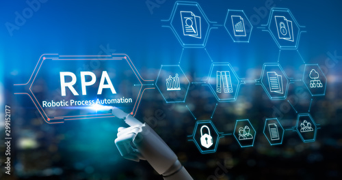 RPA (Robotic Process Automation system),Artificial intelligence , Robot finger,robo advisor ,Big data and business concept.Robot finger on blurred background using digital RPA interface. photo