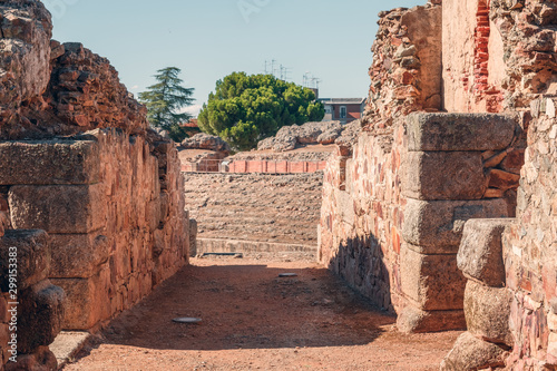 MERIDA, EXTREMADURA, SPAIN - AUGUST 08, 2019: Roman Theatre and Amphitheatre. Tourists in the architectural and monumental complex of the ancient and picturesque streets of Merida