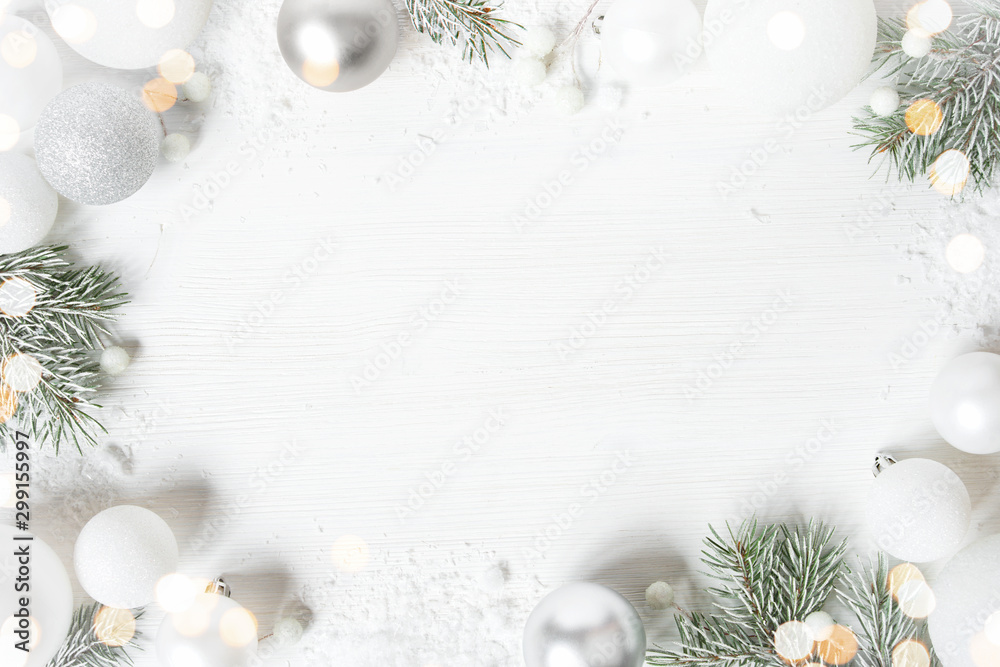 White Christmas background with spruce frosty brunches and Christmas lights - obrazy, fototapety, plakaty 