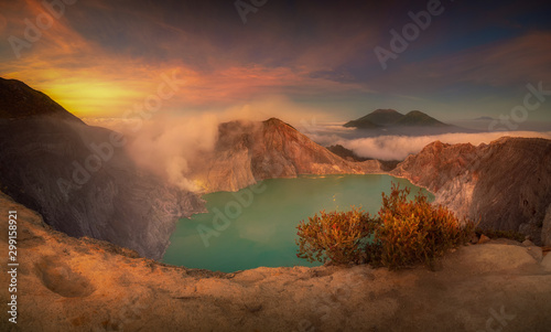 Landscape view of Kawah Ijen at Sunrise. The most famous tourist attraction in Indonesia. photo