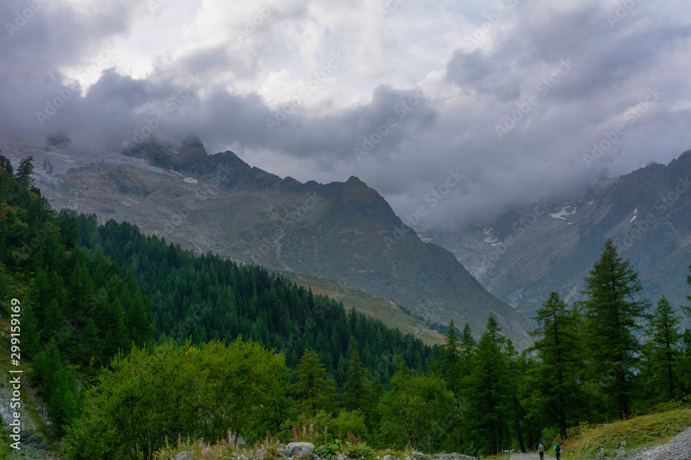 Wonderful views of the mountains in the Swiss Alps with backpackers.