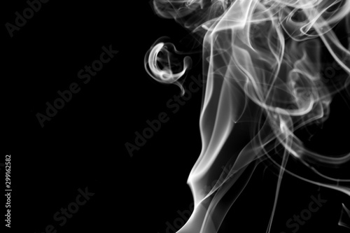Fototapeta Naklejka Na Ścianę i Meble -  abstract Smoking white. Explosive powder white Smoke on black background.