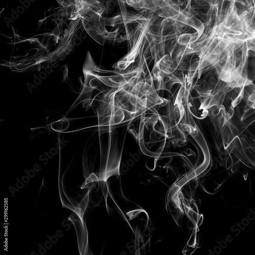abstract Smoking white. Explosive powder white Smoke on black background.