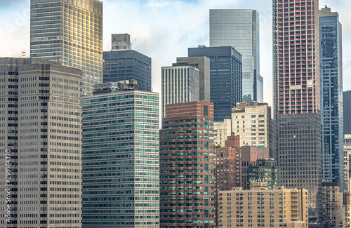 View of buildings in New York City from Brooklyn Bridge in the morning.