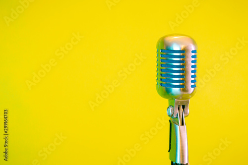retro microphone, yellow background, placed on the right