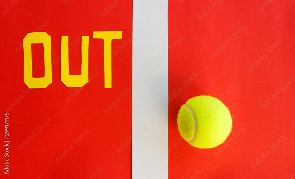 the inscription out next to a line of a tennis court with a tennis  ball/writing out tennis indicates that the ball has not touched the line  Photos | Adobe Stock