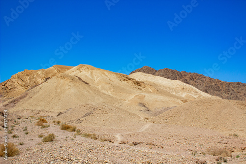 desert dry and warm scenic landscape sand stone rocky hills view in clear day weather time 