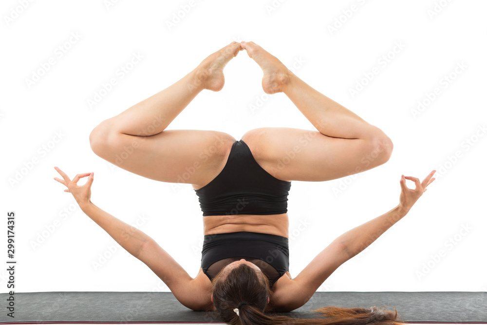 Obraz premium beautiful flexible woman doing yoga poses on white background