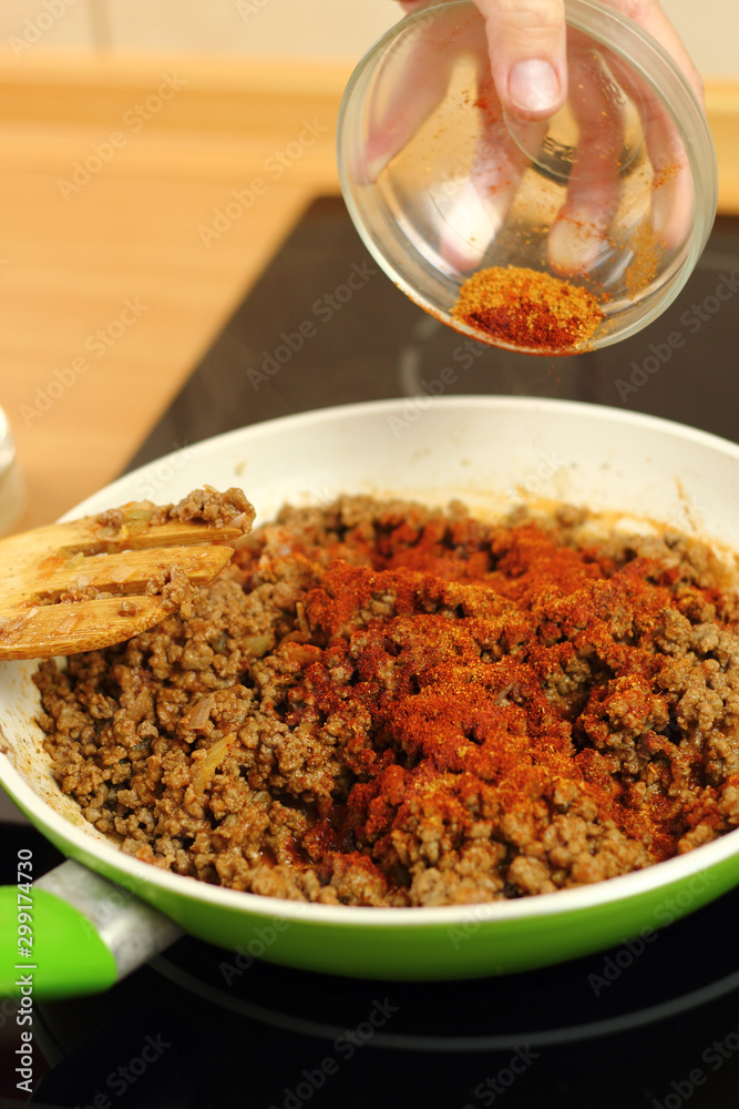 Adding mix spices into ground beef Adding mix spices into ground beef