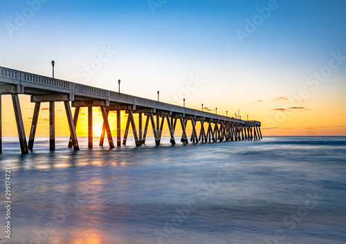 Johnnie Mercers Fishing Pier at sunrise in Wrightsville Beach east of Wilmington,North Carolina,United State. photo