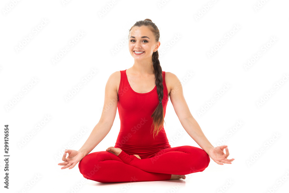 woman practices yoga and meditates in the lotus position