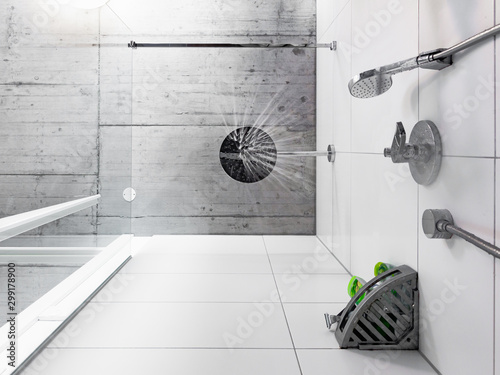 Looking straight up to the shower head from below in a bathroom of a modern home with a concrete industrial ceiling. Water drops start falling down.