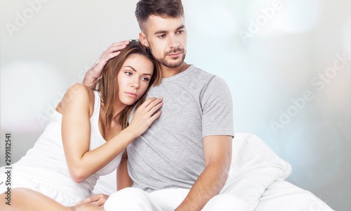 Young couple in bed.
