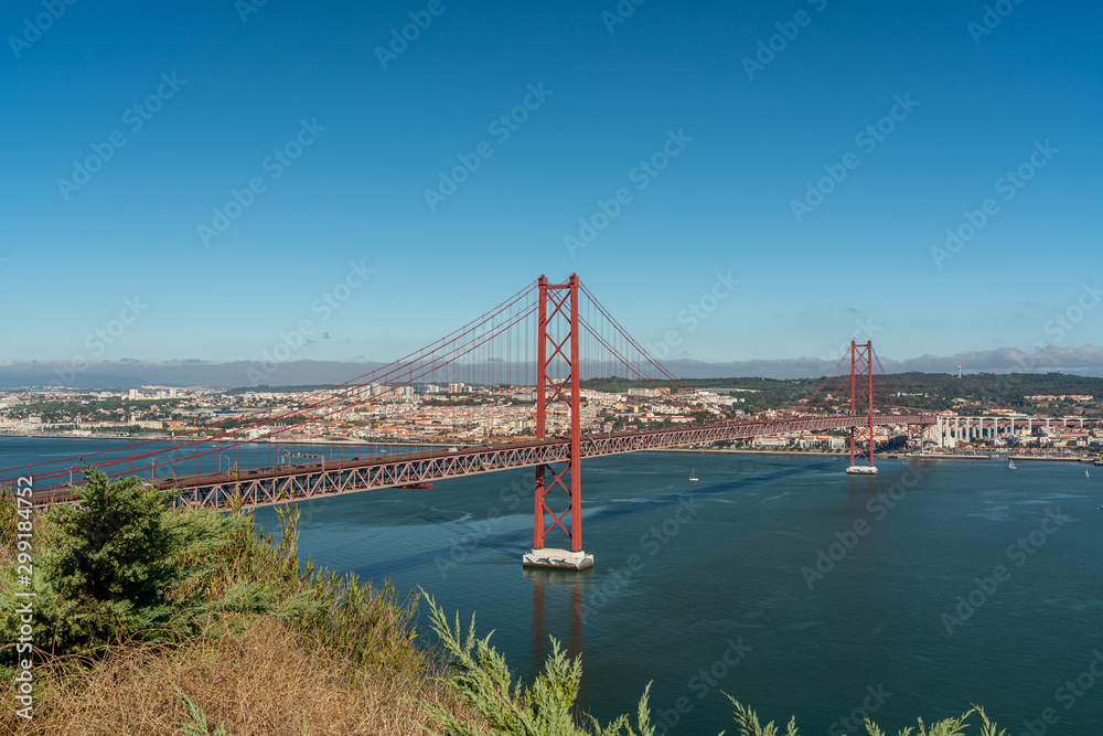 April 25 bridge with a view of Lisbon, in the summer. Portugal.