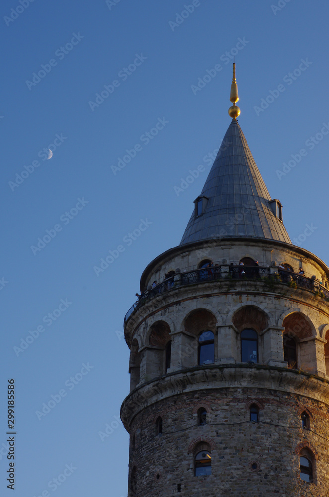 The Galata Tower and the moon, Istanbul, Turkey
