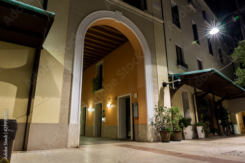 Entrance gate to the latin square piazza del quartiere latino in city center Treviso Italy © Lukreo